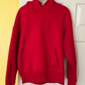 RED HOODED sweatshirt size Medium wore 3s
With kangaroo pockets